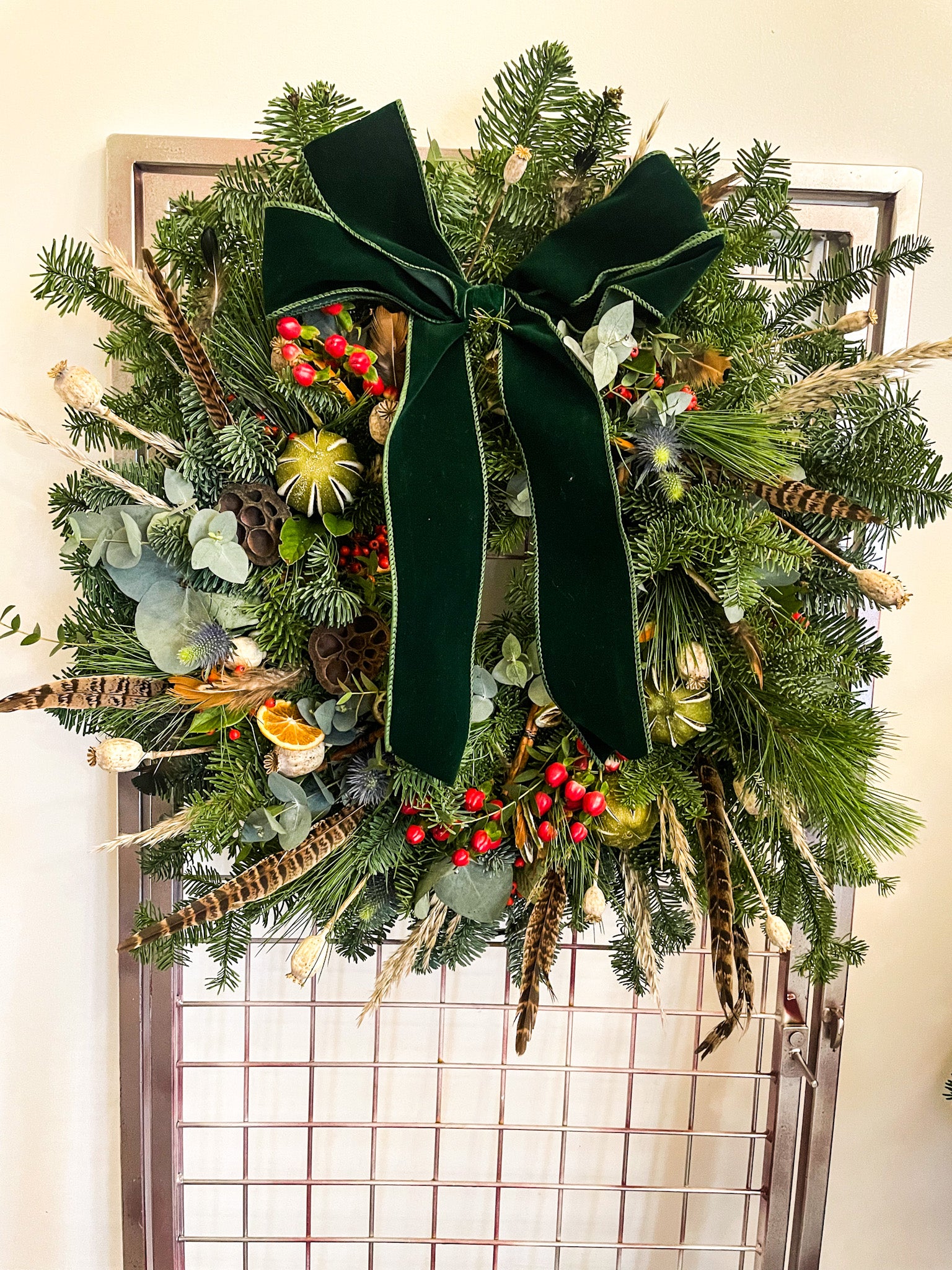 Feathers & Berries Christmas wreath with pampas grass, eucalyptus, and berries – handmade by Barns Florals.