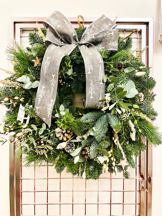 Snow Queen & Pine Christmas wreath with fresh pine, spruce, and frosted details – handmade by Barns Florals.