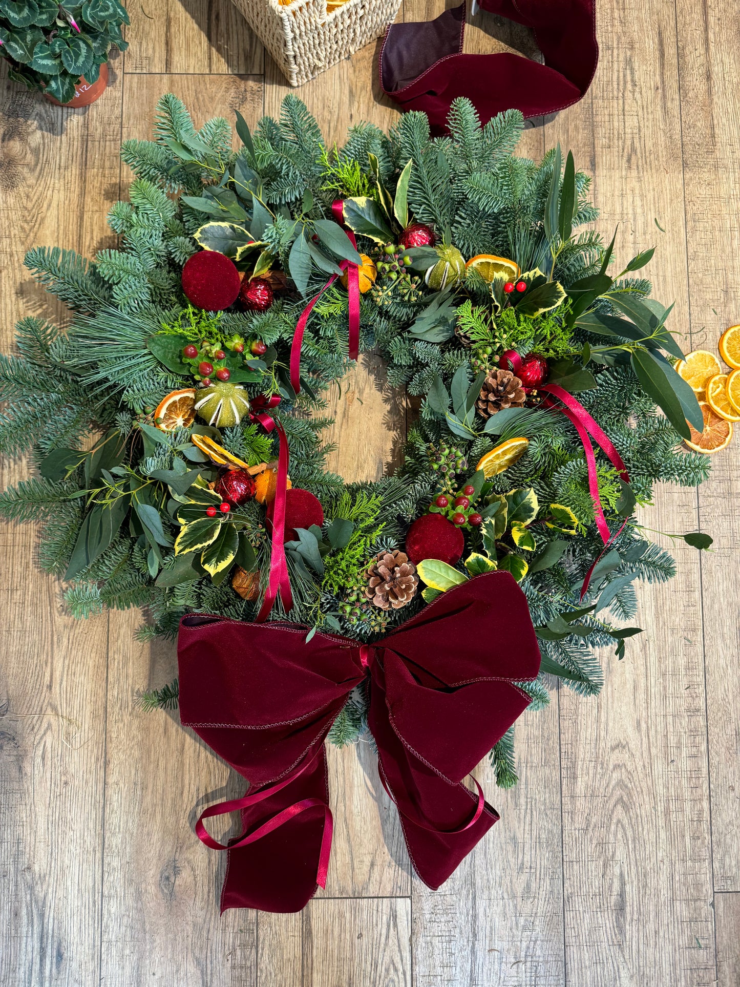 The Holiday Wreath by Barns Florals – luxury handmade Christmas wreath with spruce, eucalyptus, and velvet bow